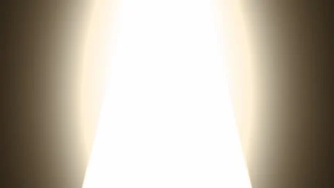 Blinding white light appearing as a door opens in a dark room. 4K Stock-Footage 345111565