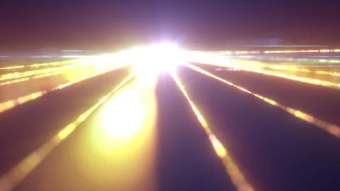 Blinding white-yellow light source at the vanishing point, surrounded by lumi Foto stock