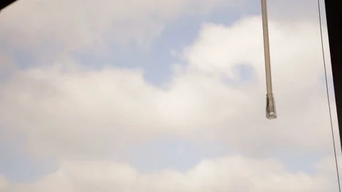 Blinds drop down in an office window Stock Footage 87831533