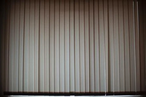 Blinds in room. Window closed from light. Blinds covered light. Stock Photos