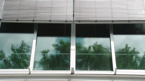 Blinds scrolling down outside window Stock Footage 93522233