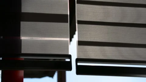 Blinds swaying in the wind at the window 库存影片 155865108