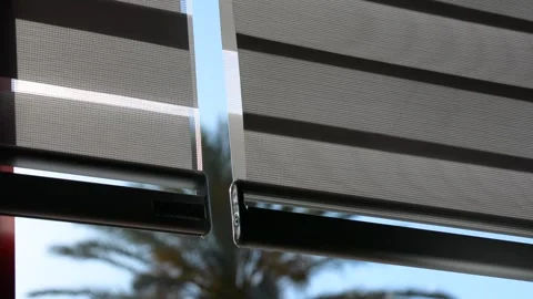 Blinds swaying in the wind at the window 库存影片 155865116