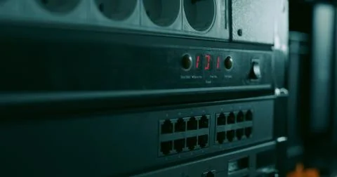 Blinking 101 red lights on a switch in a datacenter or network room rack Stock Photos