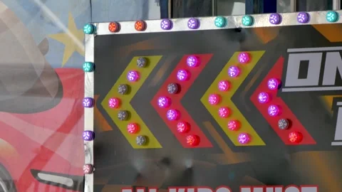Blinking arrow lights on carnival ride Stock Footage 313196973