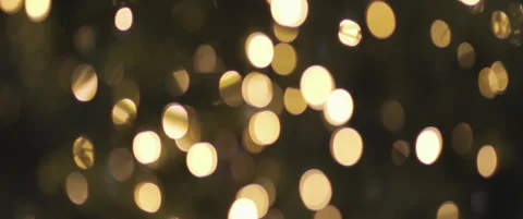 Blinking bulbs out of focus bokeh 5.7K anamorphic video Stock Footage 324012976