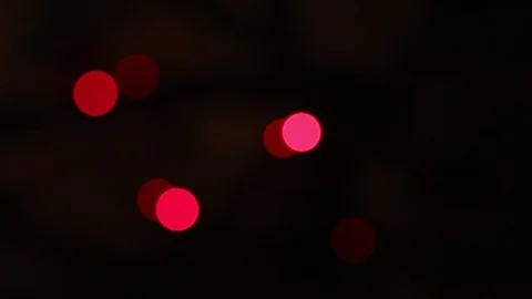 Blinking Christmas tree lights on dark blurred background Stock Footage 128764453