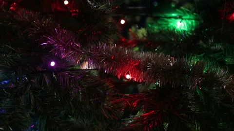 Blinking Christmas tree lights, Festive garlands on the tree Stock Footage 127019506