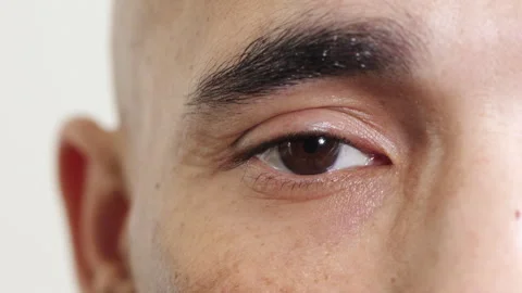 Blinking, eye and vision with man in studio for optometry appointment or Video stock 336672588
