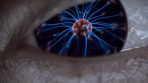 Blinking eye with a plasma ball in the pupil Stock Footage 82691512