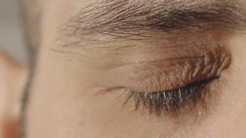 Blinking eyelid, stressed or tired male eye. Sleepy eye Stock Footage 148387617