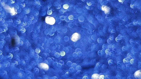 Blinking, glittering and sparkling blue bokeh lights inside the New Year or Vidéo 122413426