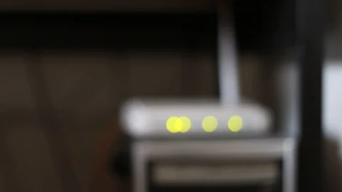 Blinking the indicators on the router. Out of focus green blinking lights of Stock Footage 112874811