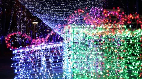 Blinking LED light and bokeh particles. LED lights christmas gift. blinking LED Stock Footage 79495927