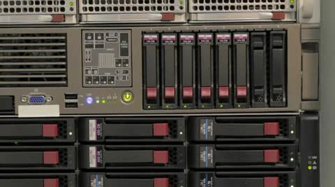 Blinking LEDs of server stack with hard drives in a datacenter Stock Footage 8959798