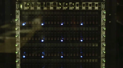 Blinking LEDs of server stack with hard drives in a datacenter Stock Footage 50027107