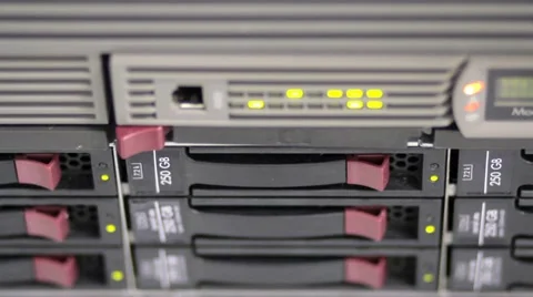 Blinking LEDs of server stack with hard drives in a datacenter Stock Footage 63358173