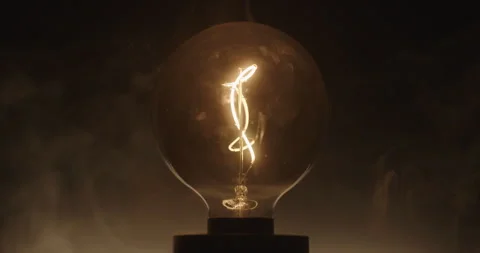 Blinking light bulb. Fire danger concept. Faulty electrical wiring concept. Stock Footage 327043179
