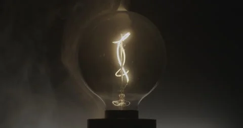 Blinking light bulb. Fire danger concept. Faulty electrical wiring concept. Stock Footage 327043183