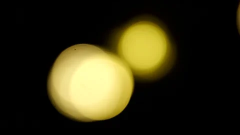 Blinking lights on black background Stock Footage 192633056