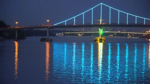 Blinking lights on night bridge, sparkle in water reflection Stock Footage 93698807