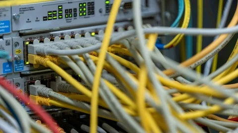 Blinking network  switch with different connected cables in server room Stock Footage 122056890