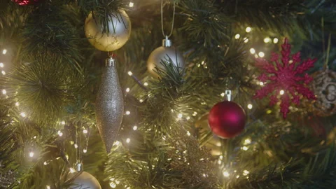 Blinking sequence of fairy lights on Christmas tree 4K video Stock Footage 240138645