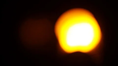 Blinking traffic light are blurred at night Stock Footage 84989411