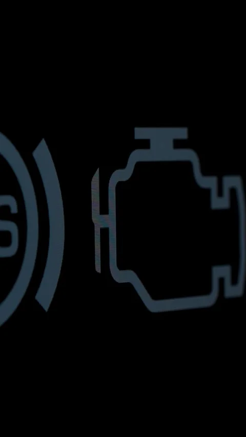 Blinking Yellow Check Engine Light, indicating a potential issue with the engine Stock Footage 283412244