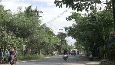 Blinking yellow LED light traffic sign in the street of Banjarmasin city Stock Footage 139333753