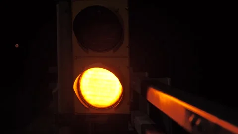 Blinking Yellow Traffic Light At Night Stock Footage 286353883