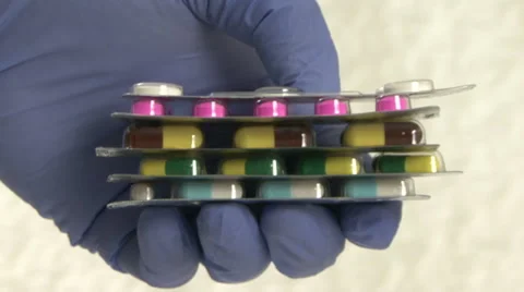 Blister capsules and doctor hands Stock Footage