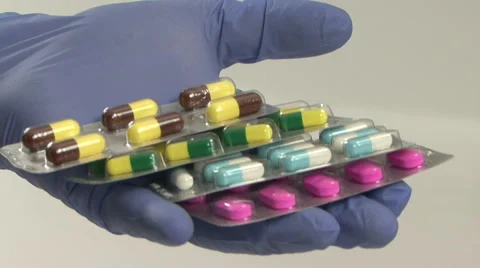 Blister capsules and doctor hands Stock Footage