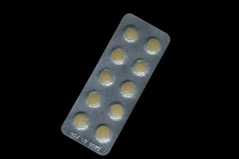 Blister Pack of Tablets on Black Background Stock Photos