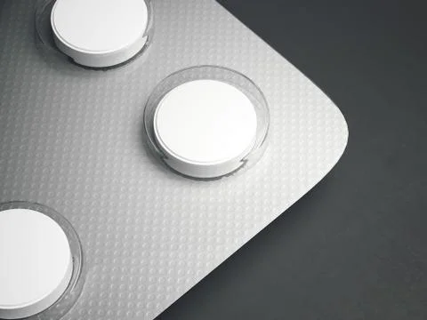 Blister pack of tablets on a gray background. 3d rendering Stock Illustration