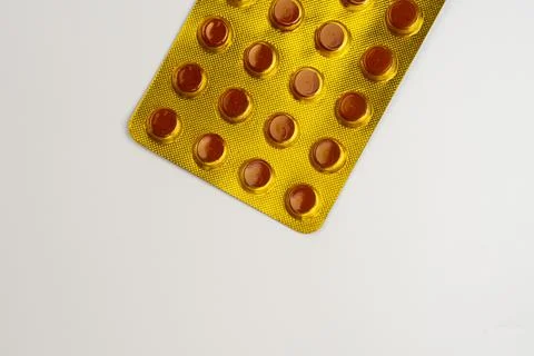 Blister pack of tuberculosis tablets isolated on a white background with a .. Фото