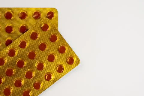 Blister pack of tuberculosis tablets isolated on a white background with a .. Photos