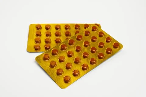 Blister pack of tuberculosis tablets isolated on a white background with a .. 库存照片