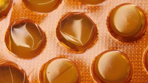 Blister with tablets rotates, close-up. Stock Footage 280097737