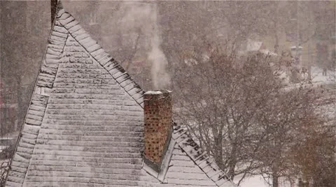Blizzard and smoking chimney Video stock 10743464
