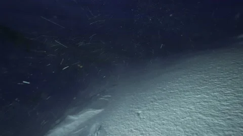 Blizzard and a strong wind on a mountain peak before sunrise Stock Footage 167773297