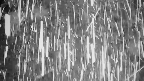 A blizzard captured on the screen of a CCTV system showing the brightly lit.. Stock Footage 327719178