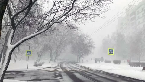 Blizzard in the city Stock Footage 234978782
