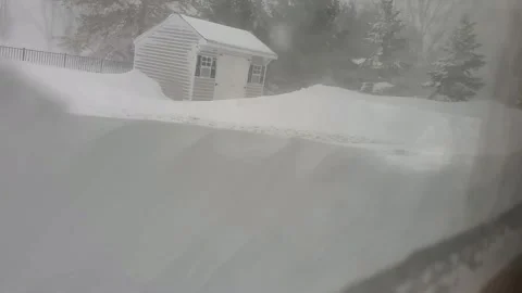 Blizzard dumps snow in Buffalo 動画素材 246782750