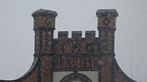 Blizzard with an old building in the background Stock Footage 268619683