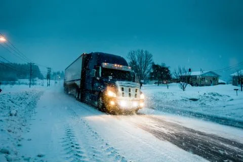 Blizzard on the Road during a Cold Winter Evening in Canada 写真素材