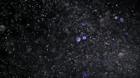 A blizzard of shiny snowflakes. Magic dust. Shimmering particles with bokeh Vídeo Stock 269707589