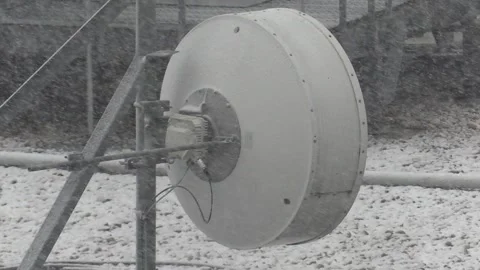 Blizzard of snow and cell tower communications equipment and cold winter weather Stock Footage 182225145