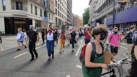 BLM CROWDS CHANTING 'THE UK IS NOT INNOCENT' AT HUGE LONDON RALLY, 4K Stock Footage 133205451