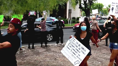 BLM Protest, next to traffic Stock Footage 131788891